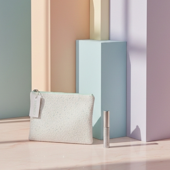 Clinique Handbags - Sparkling Pouch with Silver Eyelash Enhansing Clinique - New !